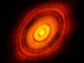 10 Kasım 2014 : ALMA'nın Gözüyle HL Boğa'daki İlkel Gezegen Oluşum Diski